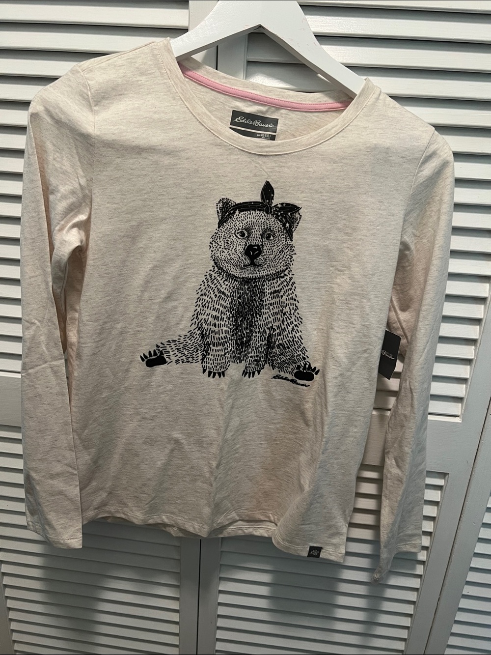 #3126**Eddie Bauer Cream Long-Sleeve Tee with Black Bear Graphic